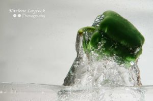 Green Pepper dropping into water 2