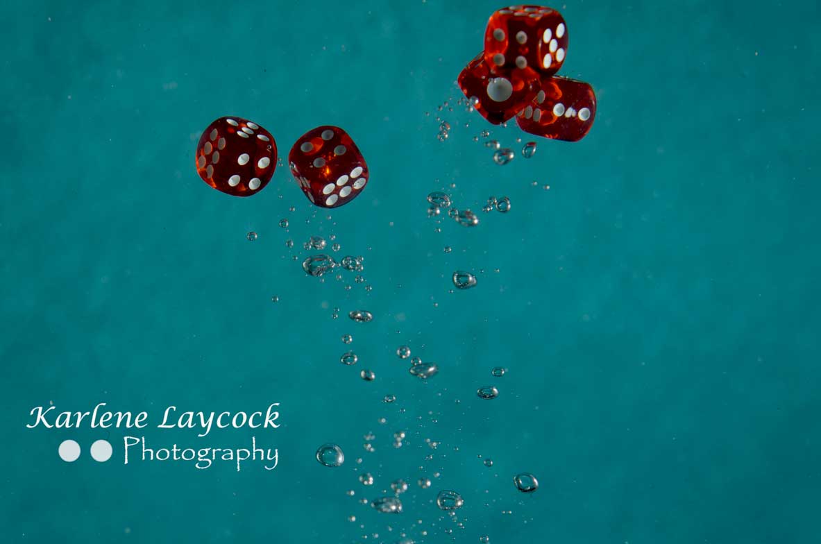 Red Dice Bubbling in Water 5