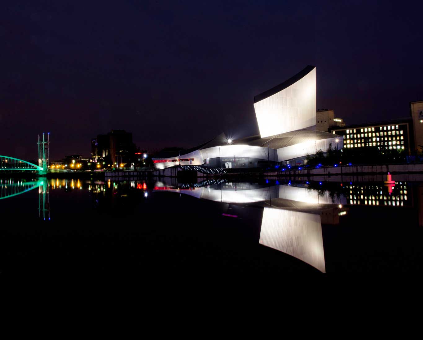 Photograph of Salford Quays at Night Reflected onto the Quays